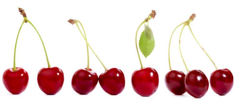 Group of cherries isolated on white