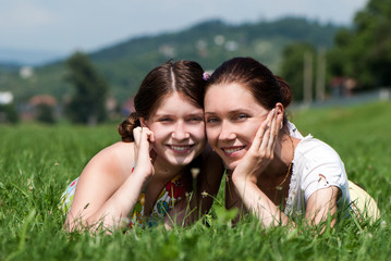 Mother and daughter outdoors