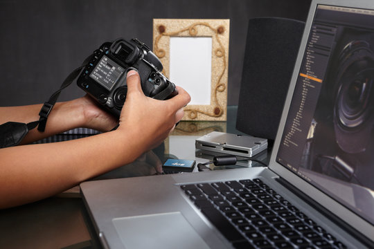Photographer preparing camera