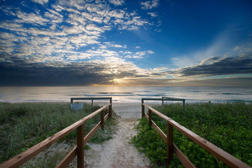 entry to beach at sunrise