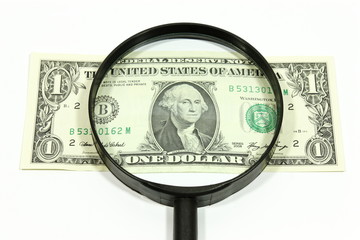 US dollar with magnifying glass