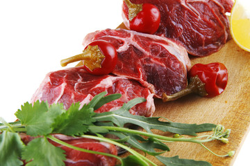 fresh beef medallion on wood