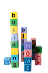 home building blocks in letters upright