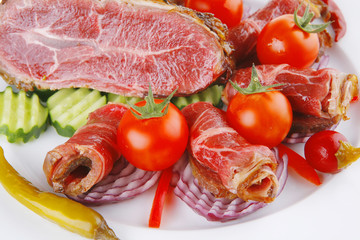 meat rolls and chunk on white