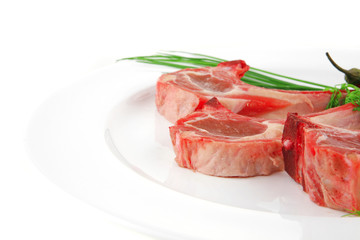 uncooked ribs on plate