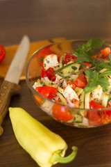 Salad in glass dish in the kitchen