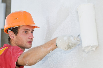 builder facade painter at work