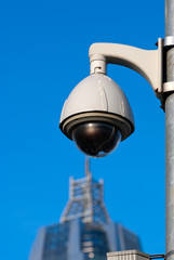 Surveillance Cameras of Office Building Under Blue Sky