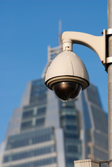 Surveillance Cameras of Office Building Under Blue Sky
