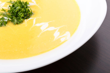 Bowl of hot delicious pumpkin soup