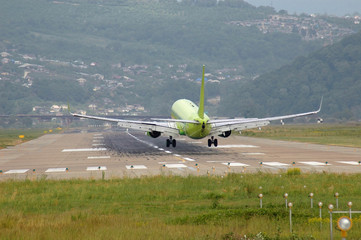 Airplane Just Before Landing On Runway