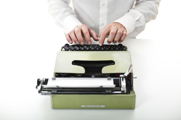 man with vintage typewriter