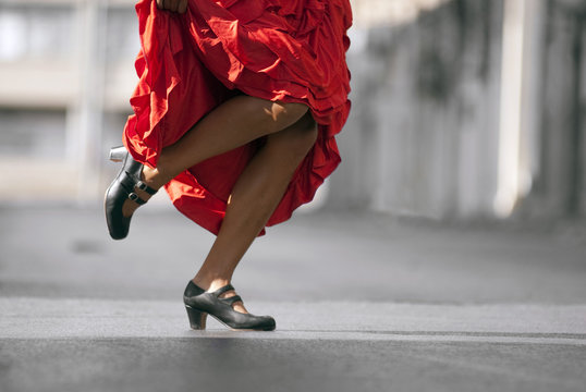 Flamenco Dancer's legs in red dress