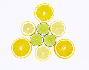 composition of slices of orange, lime and lemon on white
