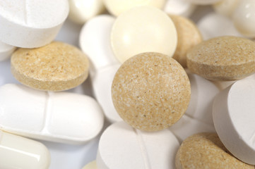 Group of medical pills and vitamins. can be used as background