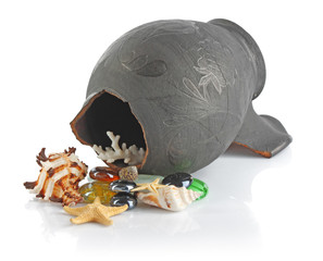 Broken amphora with seashells