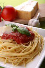 Italian pasta spaghetti with tomato sauce and parmesan.