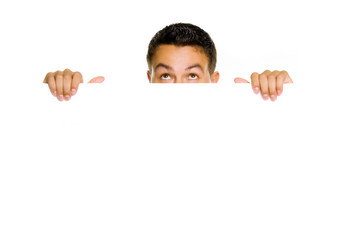 Potrait of a young guy holding blank billboard