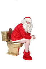 man in Santa costume sitting on a golden toilet