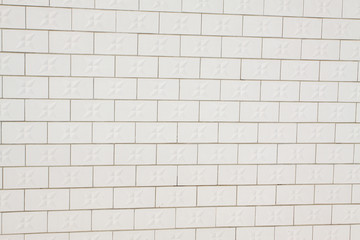 white ceramic tile wall