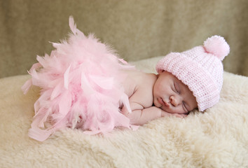 Sleeping Baby Girl Wearing Pink Hat