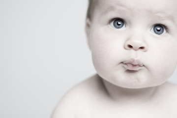 Blue eyed baby close-up