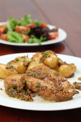 Fototapeta premium Roast pork with baby potatoes