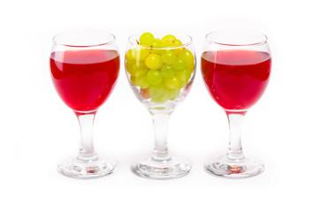 Arrangement of glasses of wine and grapes