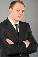 Portrait of a businessman with arms crossed