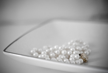 white pearls in white tray