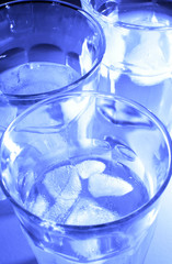 Glasses with liquid and ice