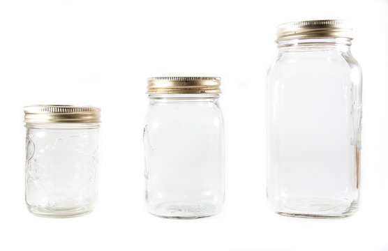 Three glass mason jars on an isolated background