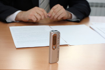 Businessman interviewing with a dictaphone