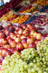 Fruit stand with grapes in market