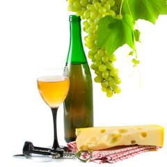 Bottle of wine, glass and grapes