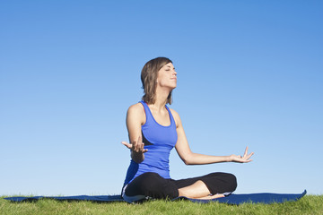 Fitness woman doing Yoga