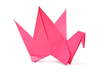 Origami crane over white