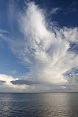 Naklejka na ściany i meble Clouds Over the Ocean