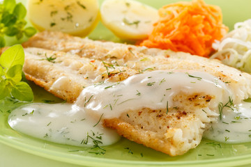 Fish dish - fried fish fillet with vegetables