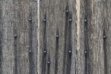 Old wooden planks with rusty nails