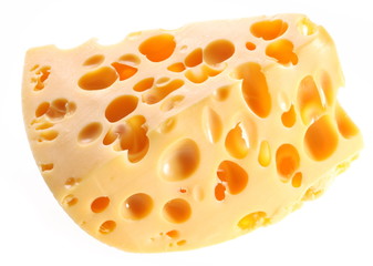 Piece of Swiss cheese on a white background.