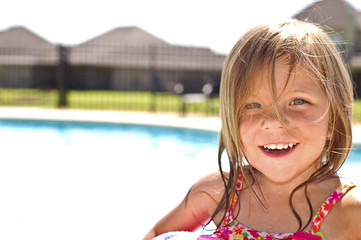 Little girl at swimming pool