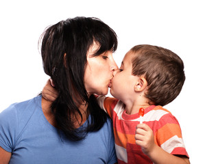 Mother and son kissing