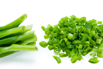 Cut green onion isolated on the white background