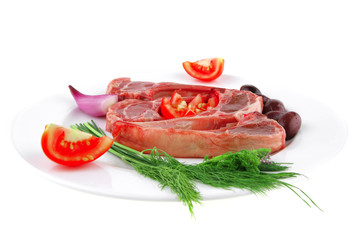 fresh raw ribs on plate
