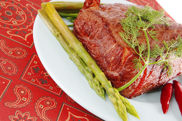 big beef block on blue dish