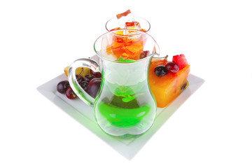 fruit icecream and beverage on plate