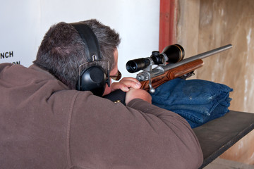 man rifle shoot