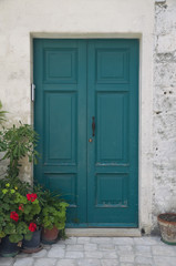 Wooden green door.