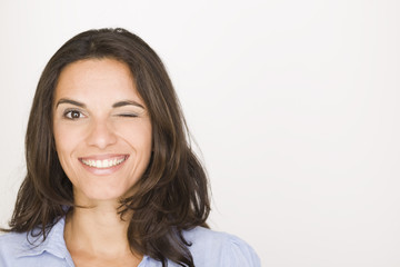 Fototapeta premium Woman blinks and twinkles